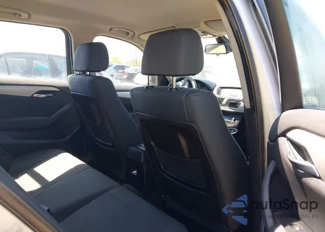 2015 BMW X1 xDrive28I z USA, uszkodzony, nr VIN WBAVL1C59FVY25831